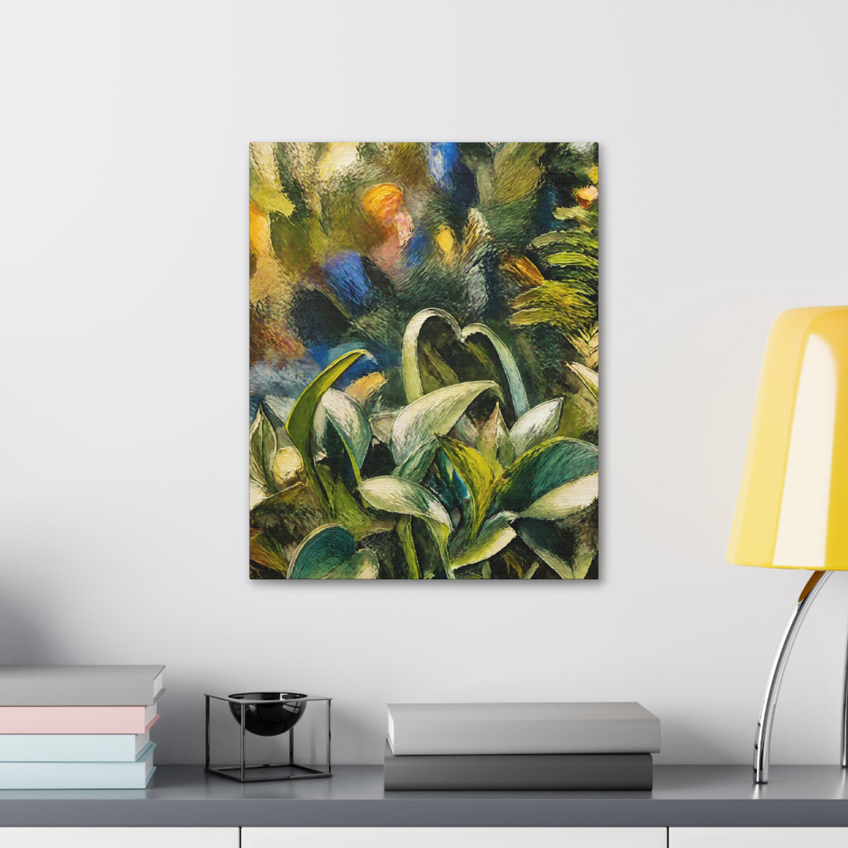 Wider Tangled Leaves canvas displayed above a gray cabinet with books and a yellow lamp
