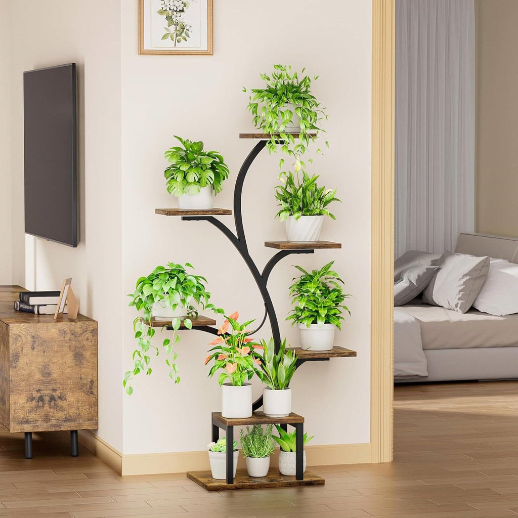 Tree-shaped 7-tier plant stand in a corner between a living room and bedroom, styled with trailing and upright houseplants