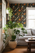 California Native wildflower wallpaper in black and multicolor styled with monstera and indoor plants in a moody editorial interior